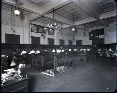 Women in room operating phone boards 3